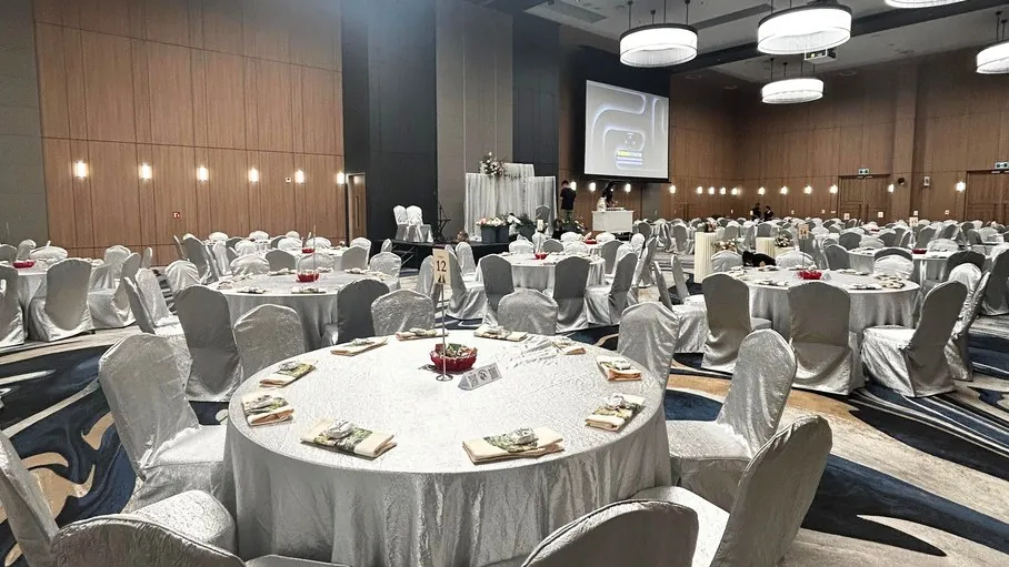 The ballroom with its projector screen